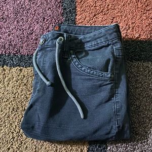 Guess jeans with white arrows